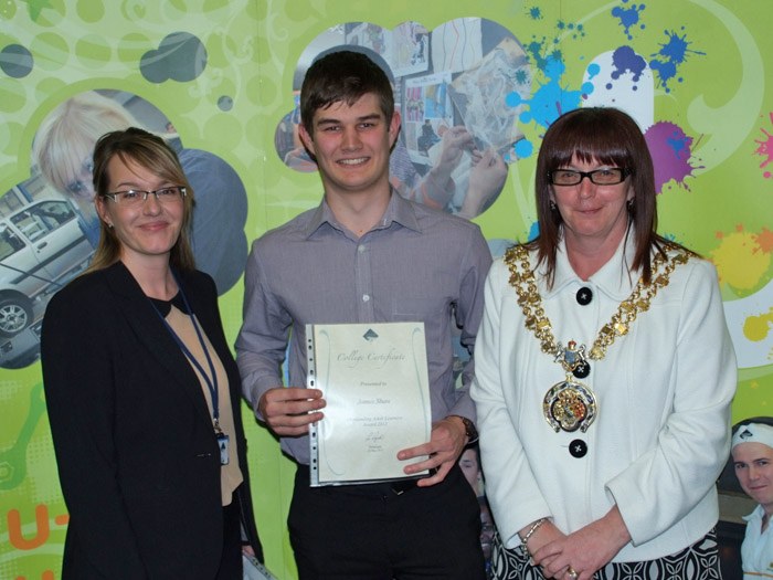 James Shaw receiving his award